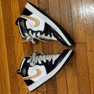 Kids Black and Gold Jordans